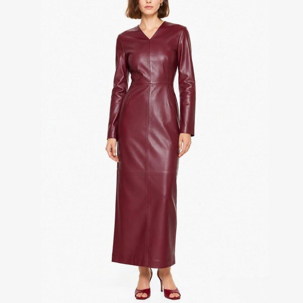 Burgundy leather dress worn by a model on a white background