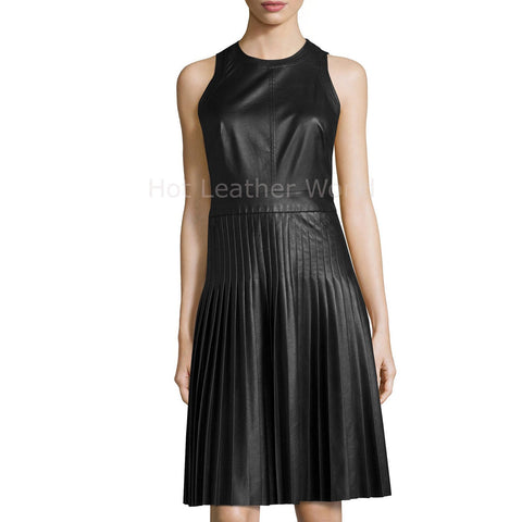 This is sleeveless knee length leather dress with accordion pleat