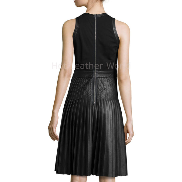 This the back style of the sleeveless dress with back zipper and accordion pleats.